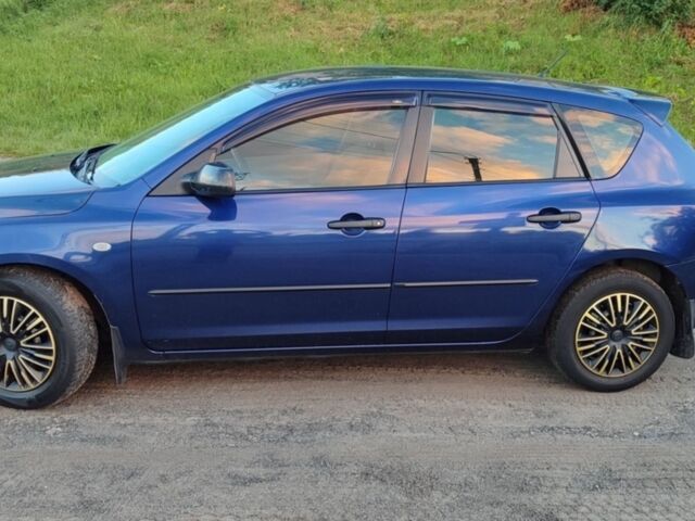 Синій Мазда 3, об'ємом двигуна 1.3 л та пробігом 219 тис. км за 4000 $, фото 1 на Automoto.ua