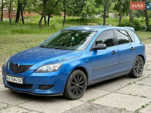 Синий Мазда 3, объемом двигателя 1.35 л и пробегом 243 тыс. км за 3300 $, фото 1 на Automoto.ua