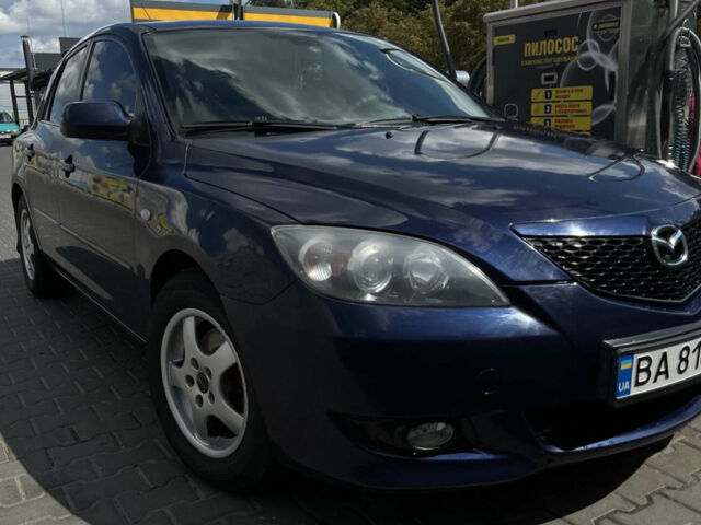 Синий Мазда 3, объемом двигателя 1.6 л и пробегом 318 тыс. км за 3500 $, фото 1 на Automoto.ua