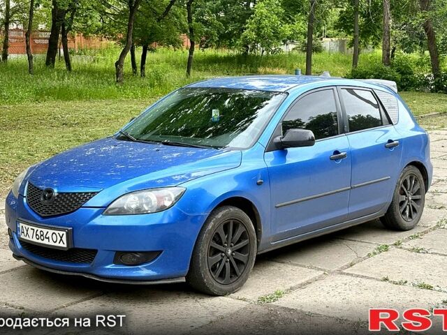 Синій Мазда 3, об'ємом двигуна 1.3 л та пробігом 243 тис. км за 3300 $, фото 1 на Automoto.ua
