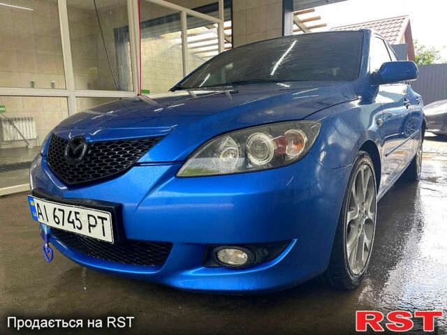 Синий Мазда 3, объемом двигателя 1.6 л и пробегом 270 тыс. км за 3300 $, фото 1 на Automoto.ua