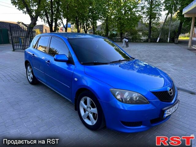 Синий Мазда 3, объемом двигателя 1.6 л и пробегом 300 тыс. км за 3100 $, фото 1 на Automoto.ua