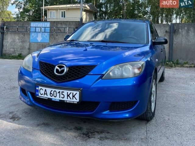 Синий Мазда 3, объемом двигателя 1.4 л и пробегом 214 тыс. км за 3800 $, фото 1 на Automoto.ua