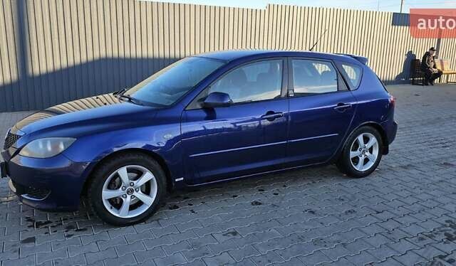 Синий Мазда 3, объемом двигателя 1.56 л и пробегом 360 тыс. км за 4200 $, фото 1 на Automoto.ua