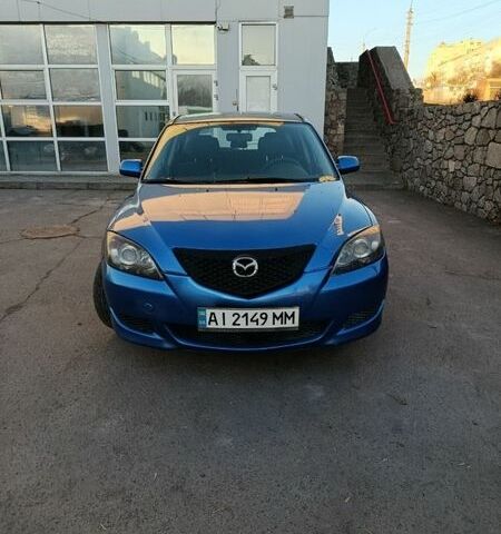 Синий Мазда 3, объемом двигателя 1.6 л и пробегом 359 тыс. км за 4600 $, фото 1 на Automoto.ua