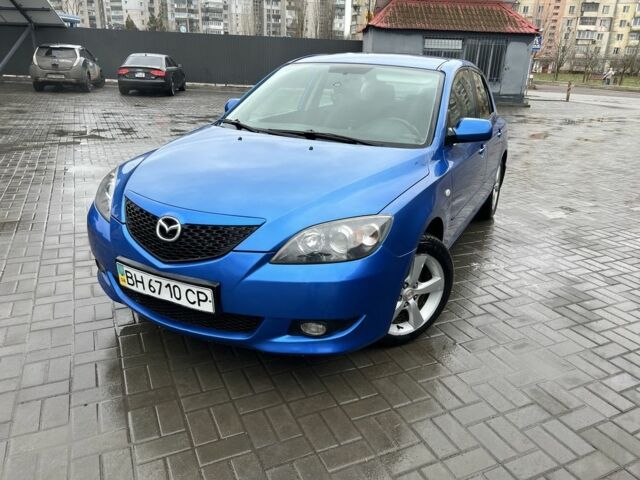 Синий Мазда 3, объемом двигателя 1.6 л и пробегом 121 тыс. км за 5600 $, фото 1 на Automoto.ua