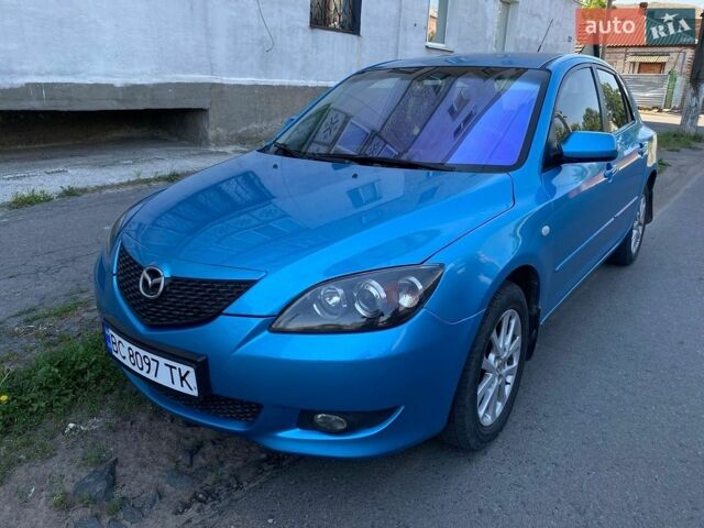 Синий Мазда 3, объемом двигателя 2 л и пробегом 255 тыс. км за 3800 $, фото 1 на Automoto.ua