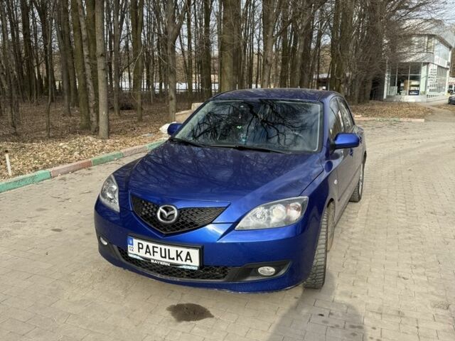 Синий Мазда 3, объемом двигателя 1.6 л и пробегом 258 тыс. км за 4600 $, фото 1 на Automoto.ua
