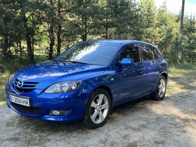Синий Мазда 3, объемом двигателя 2 л и пробегом 215 тыс. км за 3750 $, фото 1 на Automoto.ua