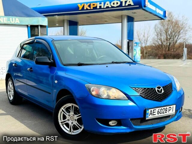 Синий Мазда 3, объемом двигателя 1.6 л и пробегом 195 тыс. км за 3750 $, фото 1 на Automoto.ua