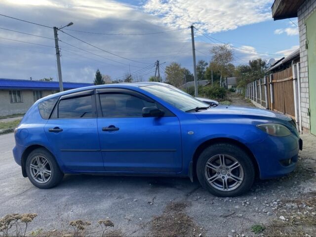 Синий Мазда 3, объемом двигателя 1.6 л и пробегом 180 тыс. км за 4000 $, фото 1 на Automoto.ua