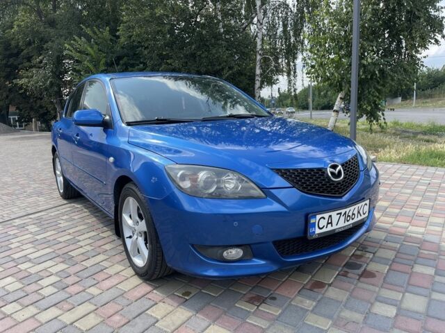Синий Мазда 3, объемом двигателя 1.6 л и пробегом 175 тыс. км за 5900 $, фото 1 на Automoto.ua