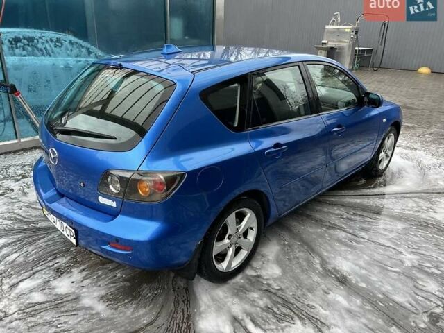 Синий Мазда 3, объемом двигателя 1.6 л и пробегом 121 тыс. км за 5200 $, фото 1 на Automoto.ua