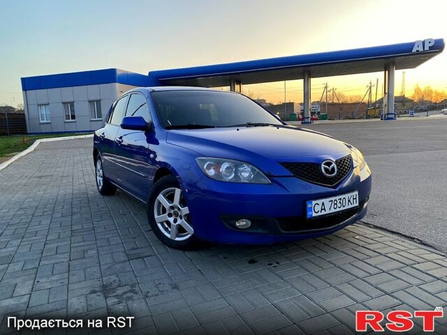 Синий Мазда 3, объемом двигателя 1.6 л и пробегом 245 тыс. км за 4700 $, фото 1 на Automoto.ua