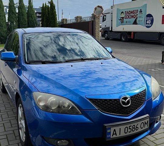 Синий Мазда 3, объемом двигателя 1.6 л и пробегом 234 тыс. км за 3500 $, фото 1 на Automoto.ua