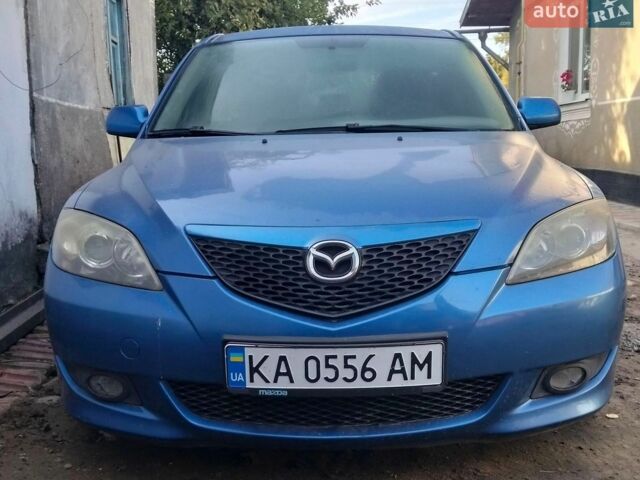 Синий Мазда 3, объемом двигателя 1.6 л и пробегом 252 тыс. км за 4650 $, фото 1 на Automoto.ua
