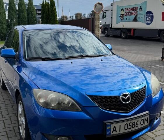 Синий Мазда 3, объемом двигателя 1.6 л и пробегом 234 тыс. км за 3500 $, фото 1 на Automoto.ua