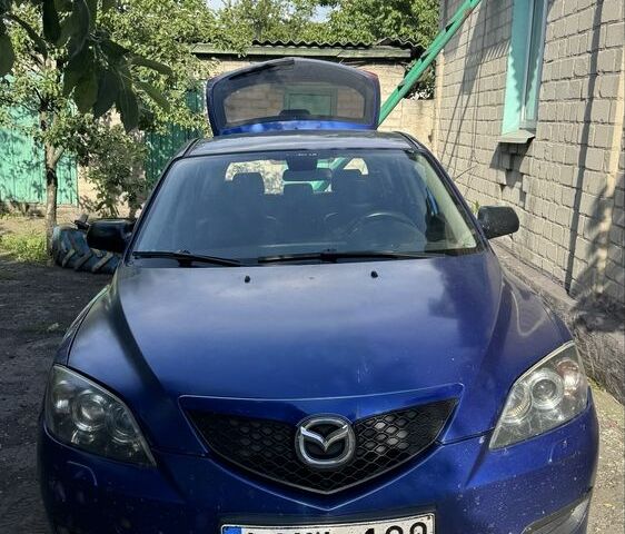 Синий Мазда 3, объемом двигателя 1.6 л и пробегом 419 тыс. км за 2499 $, фото 1 на Automoto.ua
