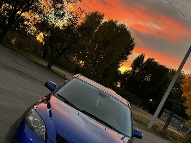 Синий Мазда 3, объемом двигателя 1.6 л и пробегом 250 тыс. км за 6000 $, фото 1 на Automoto.ua