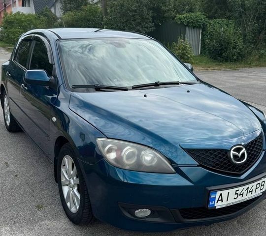 Синий Мазда 3, объемом двигателя 1.6 л и пробегом 291 тыс. км за 5200 $, фото 1 на Automoto.ua