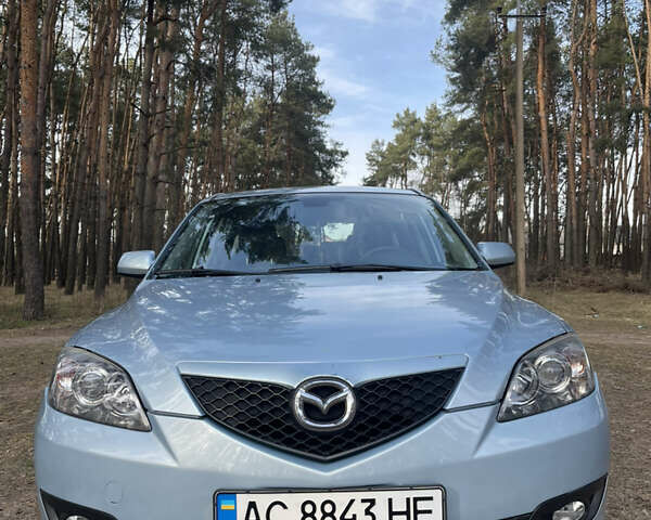 Синий Мазда 3, объемом двигателя 1.6 л и пробегом 227 тыс. км за 5400 $, фото 1 на Automoto.ua
