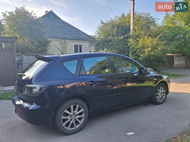 Синий Мазда 3, объемом двигателя 1.6 л и пробегом 227 тыс. км за 5500 $, фото 1 на Automoto.ua