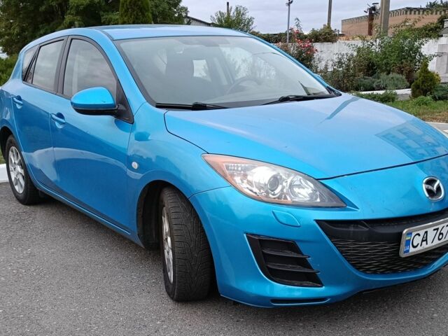 Синий Мазда 3, объемом двигателя 1.6 л и пробегом 235 тыс. км за 6850 $, фото 1 на Automoto.ua