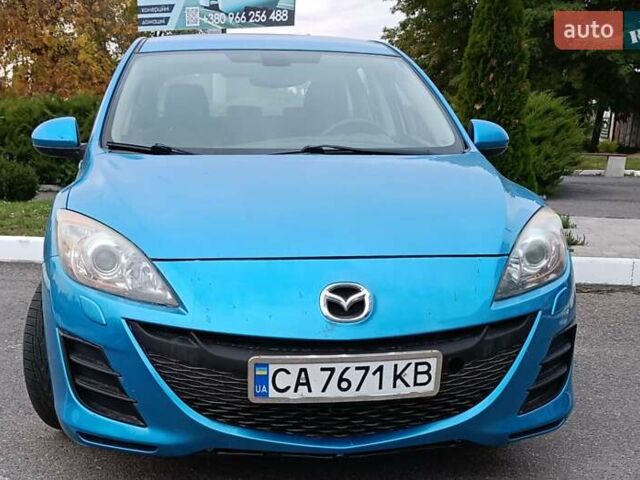 Синий Мазда 3, объемом двигателя 1.6 л и пробегом 235 тыс. км за 6650 $, фото 1 на Automoto.ua