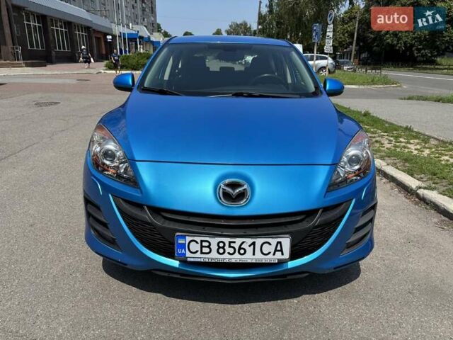 Синий Мазда 3, объемом двигателя 1.6 л и пробегом 216 тыс. км за 7000 $, фото 1 на Automoto.ua