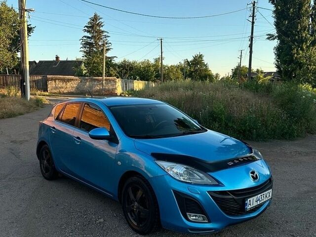 Синий Мазда 3, объемом двигателя 2.2 л и пробегом 190 тыс. км за 6000 $, фото 1 на Automoto.ua