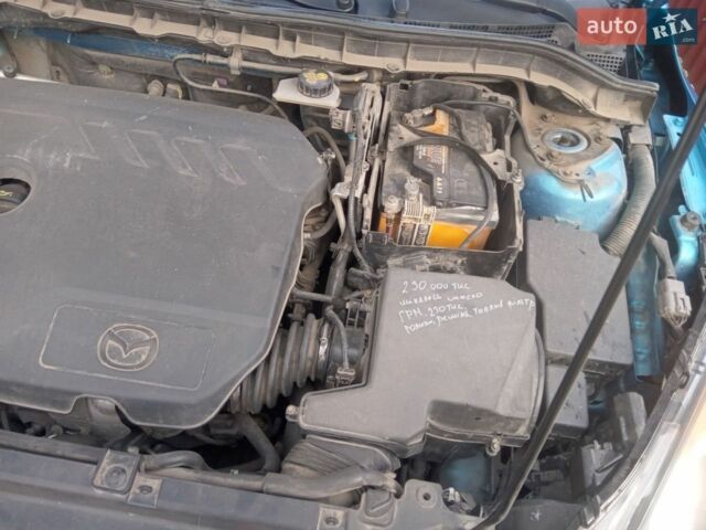 Синий Мазда 3, объемом двигателя 1.6 л и пробегом 240 тыс. км за 6800 $, фото 1 на Automoto.ua
