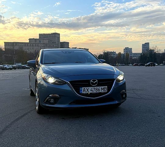 Синий Мазда 3, объемом двигателя 2.5 л и пробегом 104 тыс. км за 12000 $, фото 1 на Automoto.ua