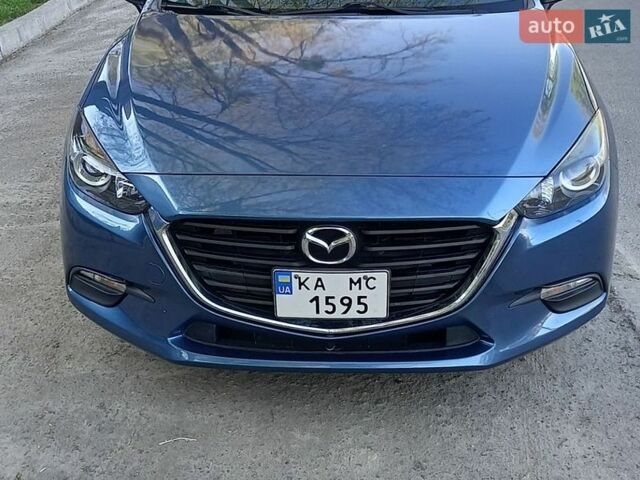 Синий Мазда 3, объемом двигателя 2 л и пробегом 228 тыс. км за 12000 $, фото 1 на Automoto.ua