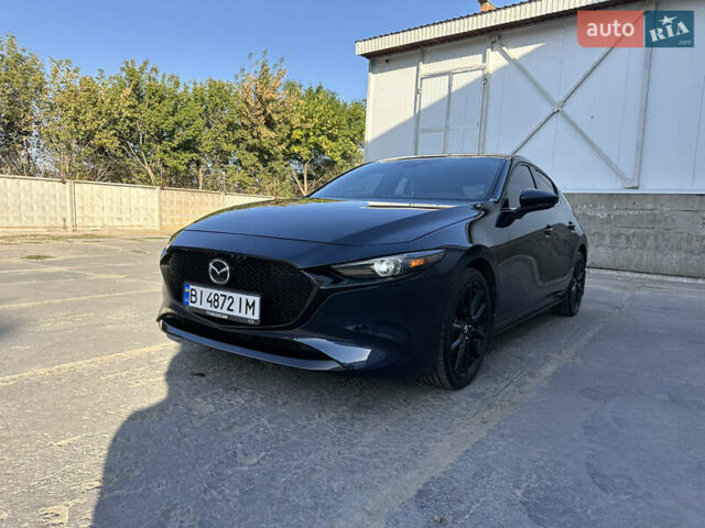 Синий Мазда 3, объемом двигателя 2.49 л и пробегом 99 тыс. км за 15400 $, фото 1 на Automoto.ua