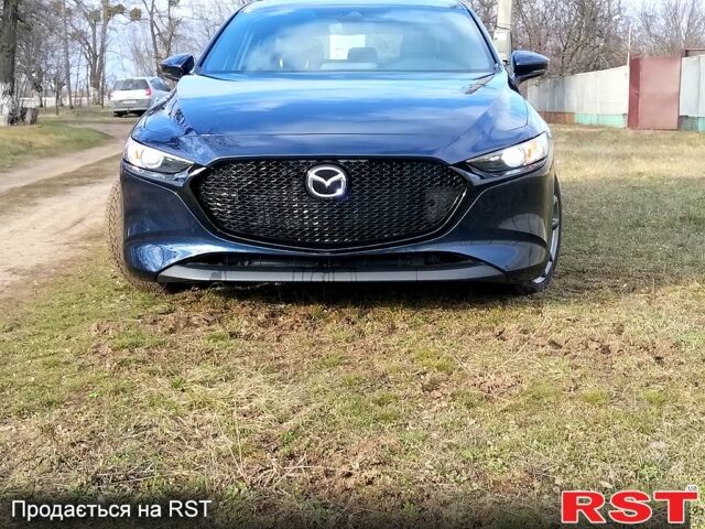 Синий Мазда 3, объемом двигателя 2.4 л и пробегом 62 тыс. км за 16500 $, фото 1 на Automoto.ua