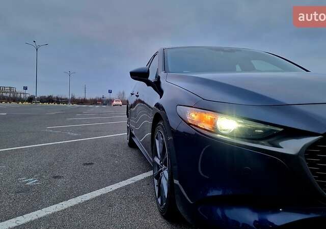 Синий Мазда 3, объемом двигателя 2.49 л и пробегом 49 тыс. км за 16700 $, фото 1 на Automoto.ua