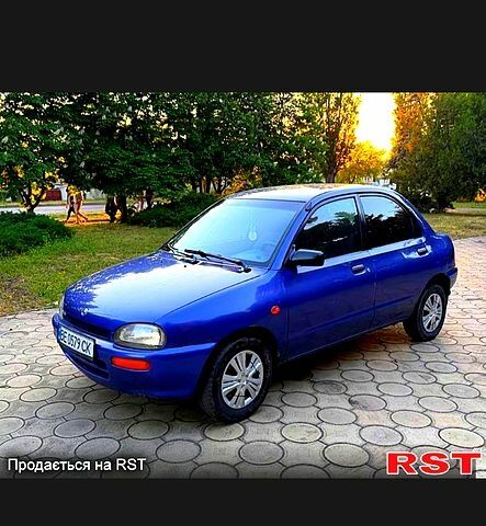Синий Мазда 3, объемом двигателя 1.3 л и пробегом 287 тыс. км за 1300 $, фото 1 на Automoto.ua
