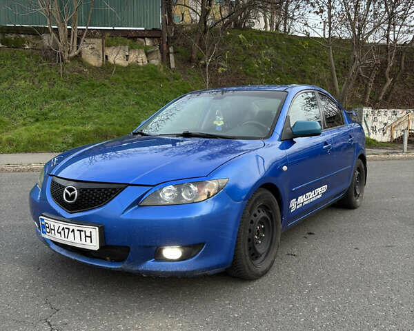 Синий Мазда 3, объемом двигателя 2 л и пробегом 325 тыс. км за 4500 $, фото 1 на Automoto.ua