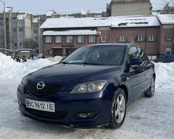Синий Мазда 3, объемом двигателя 1.56 л и пробегом 280 тыс. км за 4950 $, фото 1 на Automoto.ua