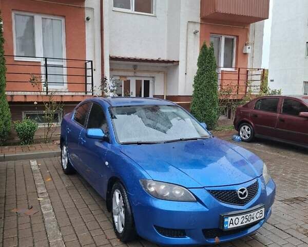 Синий Мазда 3, объемом двигателя 1.6 л и пробегом 186 тыс. км за 4450 $, фото 1 на Automoto.ua
