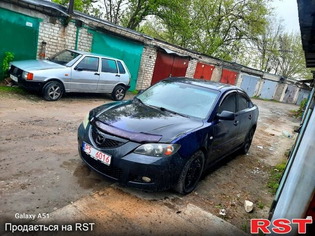 Синий Мазда 3, объемом двигателя 2 л и пробегом 240 тыс. км за 1000 $, фото 1 на Automoto.ua