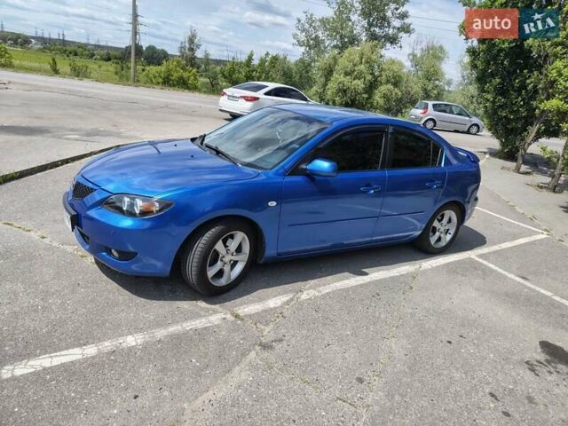 Синий Мазда 3, объемом двигателя 1.6 л и пробегом 253 тыс. км за 5500 $, фото 1 на Automoto.ua