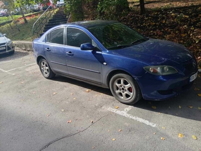 Синий Мазда 3, объемом двигателя 1.6 л и пробегом 303 тыс. км за 3206 $, фото 1 на Automoto.ua