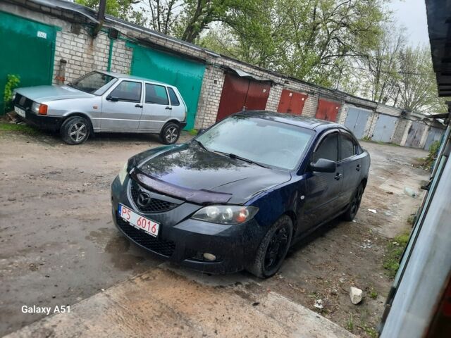 Синий Мазда 3, объемом двигателя 2 л и пробегом 240 тыс. км за 1000 $, фото 1 на Automoto.ua