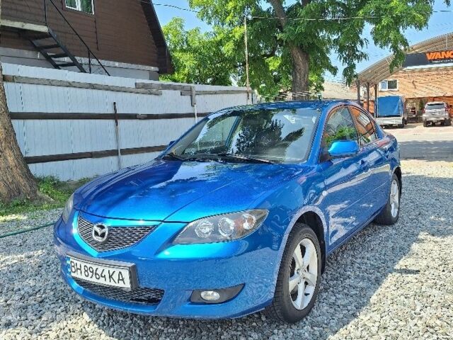 Синий Мазда 3, объемом двигателя 1.6 л и пробегом 190 тыс. км за 4850 $, фото 1 на Automoto.ua