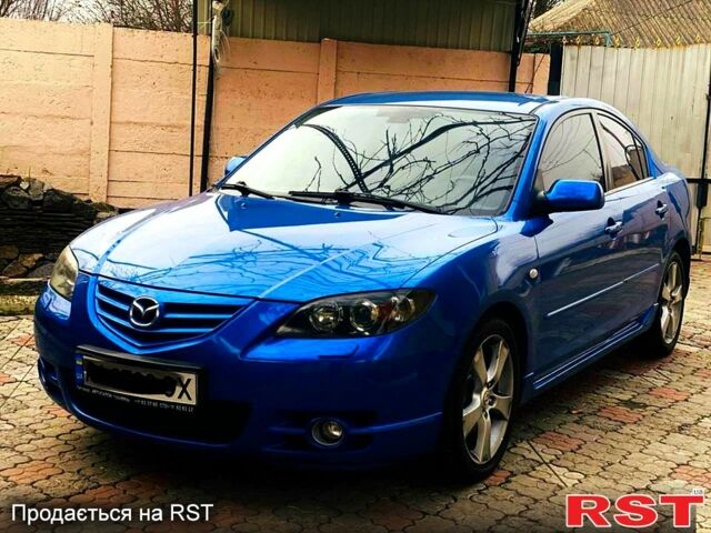 Синій Мазда 3, об'ємом двигуна 2 л та пробігом 240 тис. км за 4200 $, фото 1 на Automoto.ua