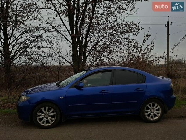 Синий Мазда 3, объемом двигателя 1.6 л и пробегом 289 тыс. км за 3500 $, фото 1 на Automoto.ua