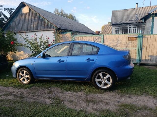 Синий Мазда 3, объемом двигателя 1.6 л и пробегом 350 тыс. км за 3515 $, фото 1 на Automoto.ua