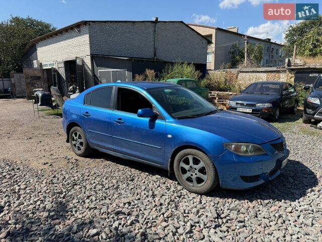 Синий Мазда 3, объемом двигателя 1.59 л и пробегом 230 тыс. км за 2400 $, фото 1 на Automoto.ua