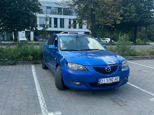 Синий Мазда 3, объемом двигателя 1.6 л и пробегом 250 тыс. км за 2100 $, фото 1 на Automoto.ua